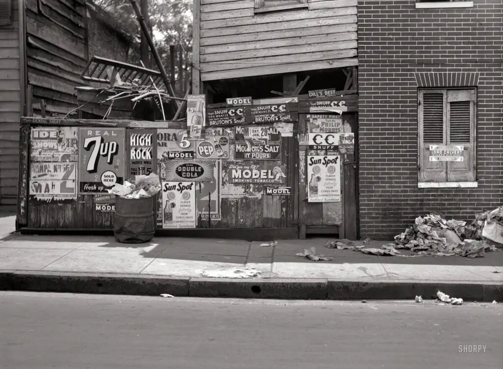 July 1938. "Rear of grocery store in Baltimore." Only hinting at the delights that await within. Medium format nitrate negative by John Vachon.